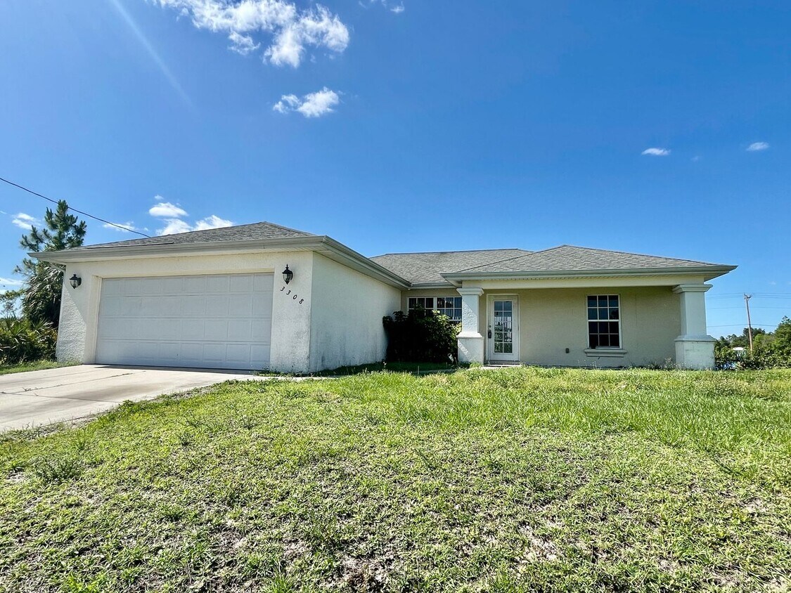Primary Photo - Lehigh Acres 3 Bedroom, 2 Bath, 2 Car Gara...