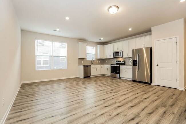 Building Photo - Welcome to your new home with Evernest! Si...
