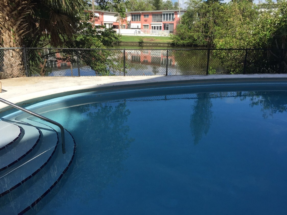 View of pool from screened in balcony - 12590 NE 16th Ave