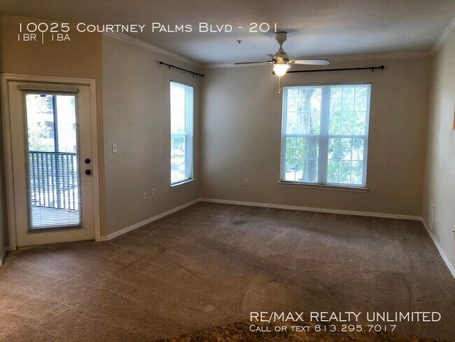 Building Photo - 10025 Courtney Palms Blvd #201 Tampa, FL 3...