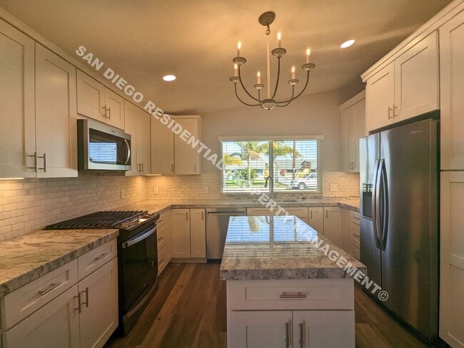 Building Photo - Renovated 3-Bedroom Home with Huge Backyar...