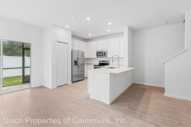 Building Photo - 3 br, 2.5 bath House - 698 NW 126th Terrace