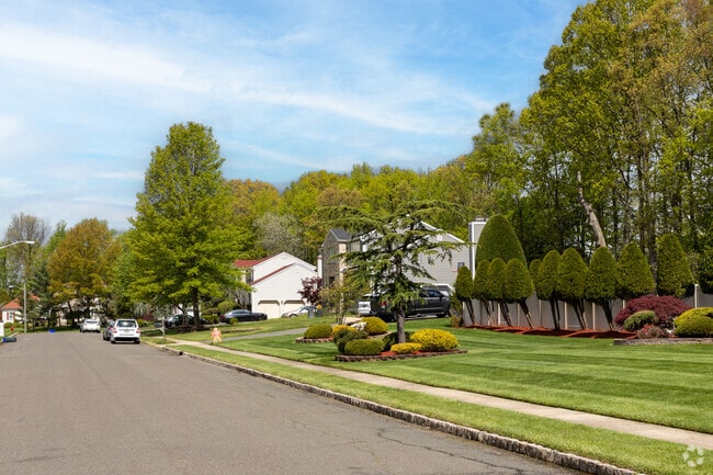 Sidewalk-lined streets in North Brunswick, NJ invite safe, walkable living.