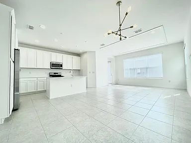 Building Photo - Modern Waterset Townhome | 4BR + Resort-Style Community Living