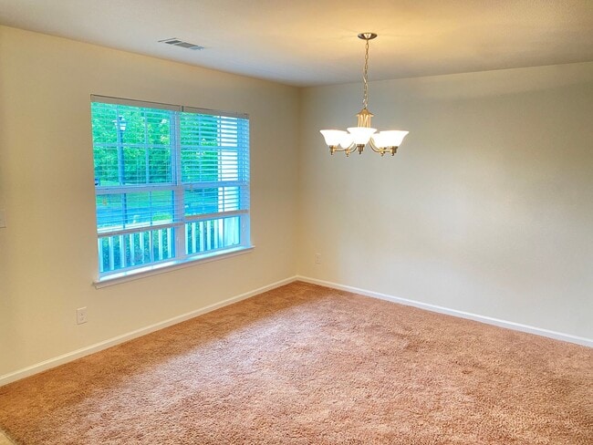 Building Photo - Suburban Tranquility With Urban Convenience