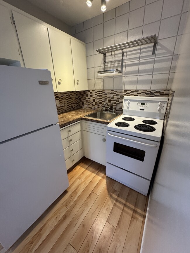 Photo - 1001-1002 2 Ave NW (Calgary, AB) Apartment