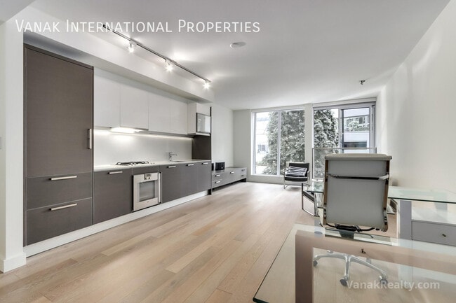 Building Photo - Modern Coal Harbour Studio with Luxury Amenities
