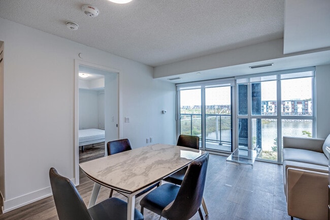 Building Photo - One Plus Den Furnished unit
