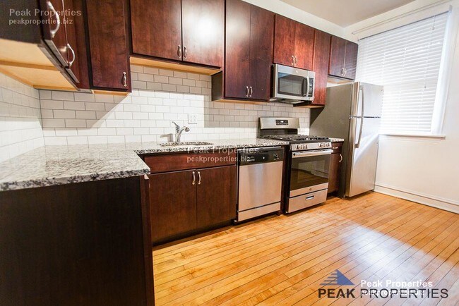 Building Photo - 1403 W Belle Plaine Ave