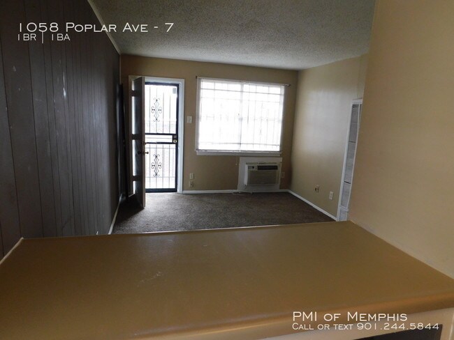 Foto del edificio - 1058 Poplar Ave Unit 7 - $99 MOVE IN SPECIAL!