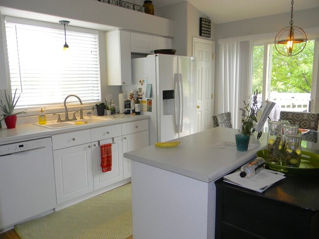 Kitchen out toward deck - 5835 S Harlan St