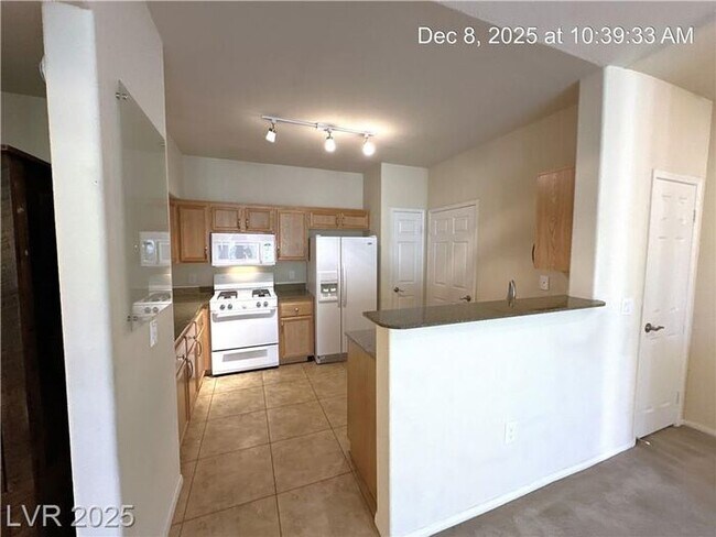 Foto del edificio - CONDO IN NORTHWEST GATED COMMUNITY