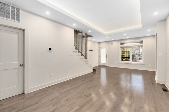 Building Photo - Experience stunning design and modern finishes in Columbia Heights!