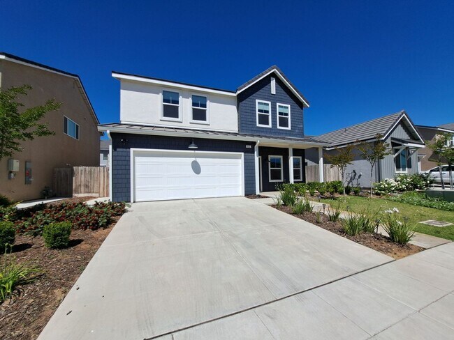 Foto del edificio - 911 Blue Oak Lane W