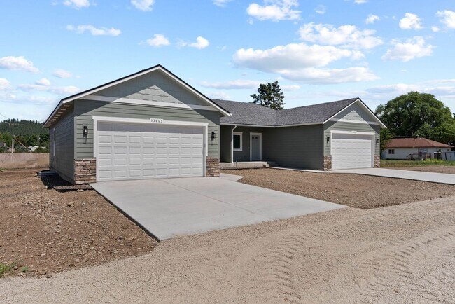 Building Photo - Newly built 4 Bedroom Duplex With Garage