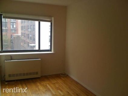 Building Photo - 130 E 28th St