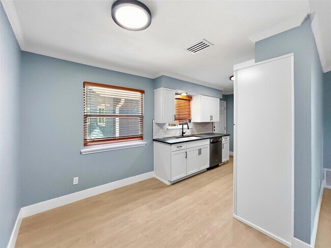 Building Photo - 7107 Dan Jean Drive Unit A