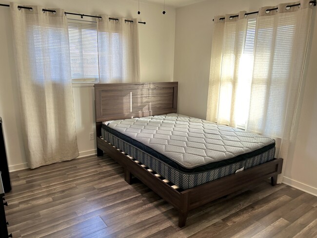 Queen bed frame and mattress - 142 Meadow Glen Dr