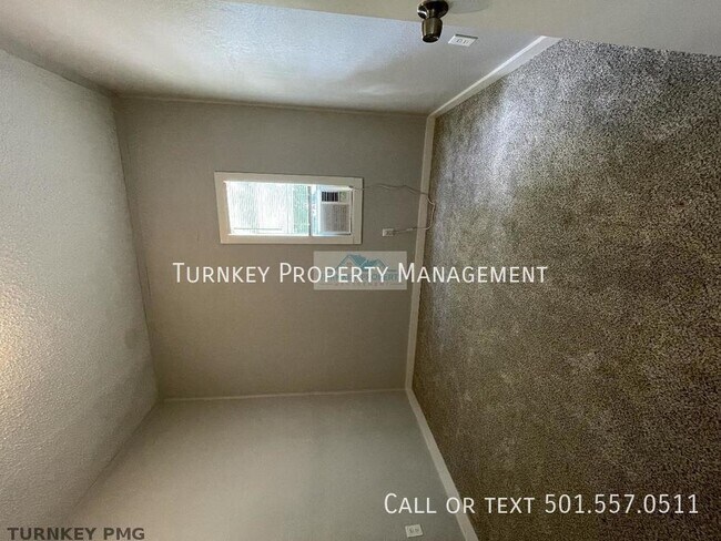 Building Photo - charming 2-bedroom, 1-bathroom home offers...