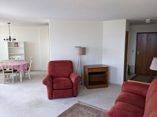 Spacious living room connected to informal dining room - 1425 W 28th St