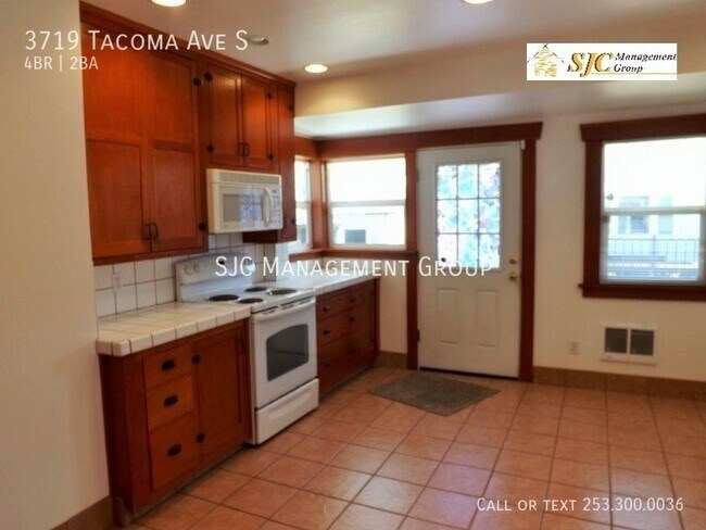 Building Photo - 4 Bedroom 1.5 bath home for rent in Tacoma