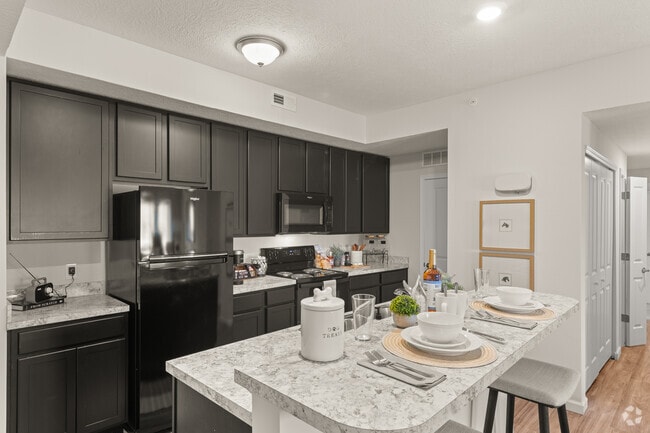 Building Photo - Residences at Golf Village