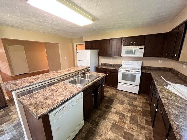 Foto del edificio - 4 Bedroom House With Large Basement