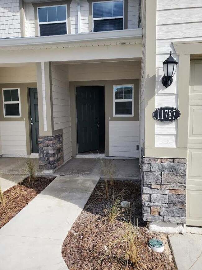 Building Photo - BRAND NEW 3/2.5 Town Home in Greenland Pla...