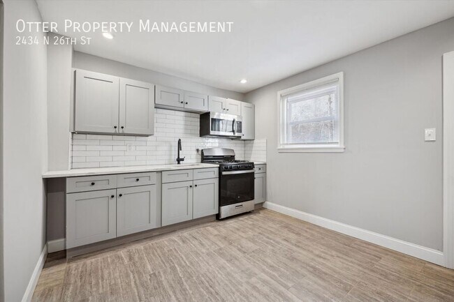 Building Photo - 2BR/1BA Large Home with Private Back Patio...