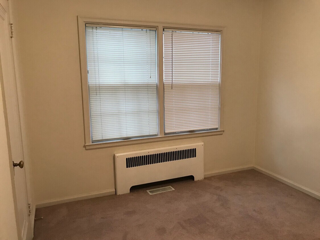 The bedroom has two large closets, fresh paint and professionally cleaned carpeting. - 509 W Marion St
