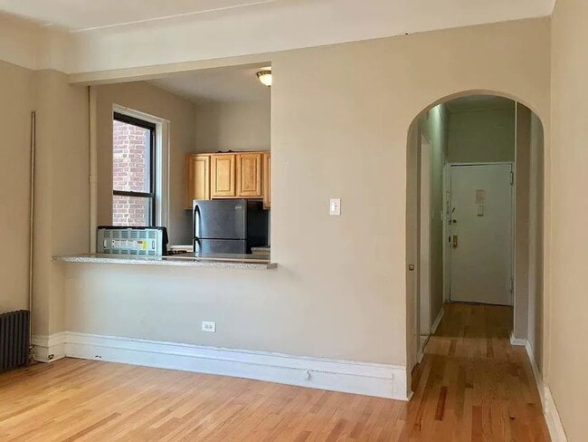 Building Photo - "Charming 1-Bedroom Retreat in Vibrant New York Locale – Your Perfect Urban Sanctuary!"