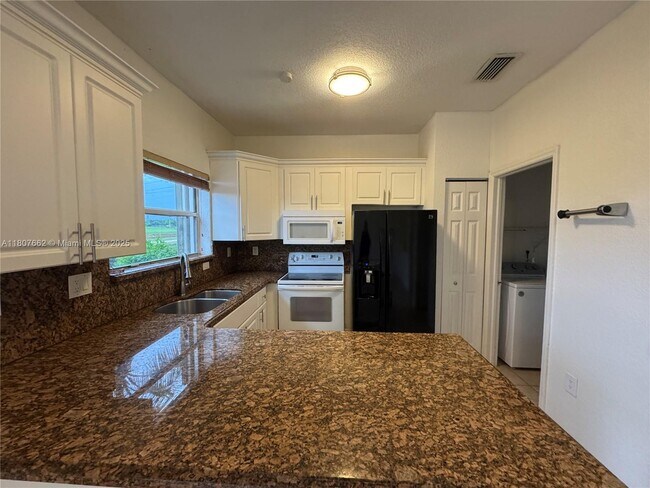 Building Photo - 12701 SW 49th Ct