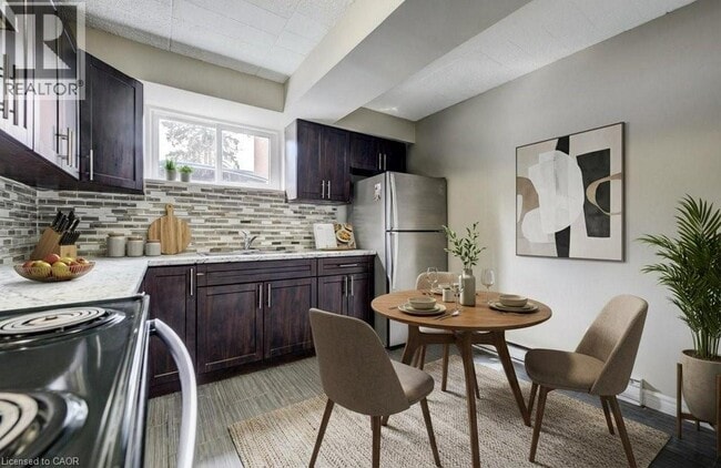 Building Photo - 320 Erb St. W