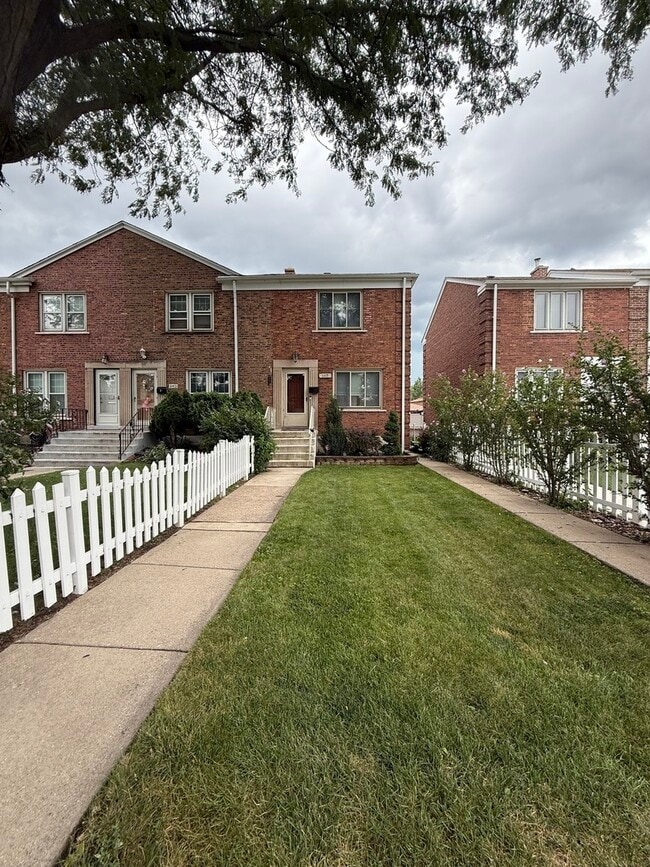 Building Photo - 6415 S Lorel Ave