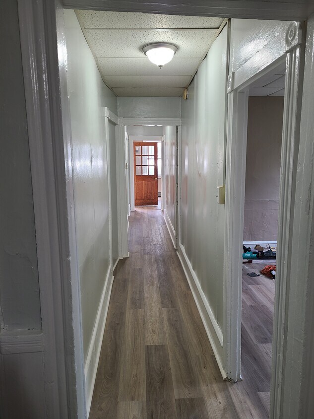Hall way new flooring - 62 Hutson St