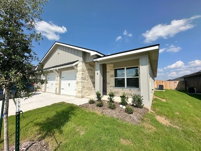 Building Photo - NEW CONSTRUCTION DUPLEX!