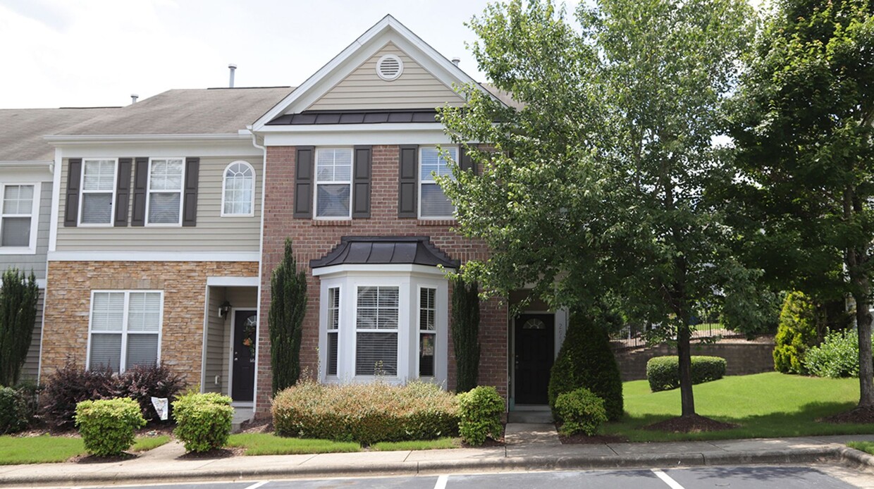 Primary Photo - End Unit Townhome in Highland Creek Commun...