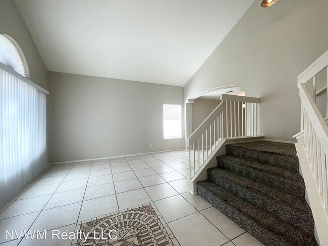 Building Photo - 4 br, 2.5 bath House - 7813 Desert Bell Ave