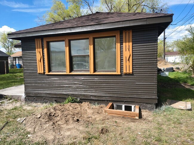Building Photo - Renovated 3 bed 1 bath fenced yard and storage shed