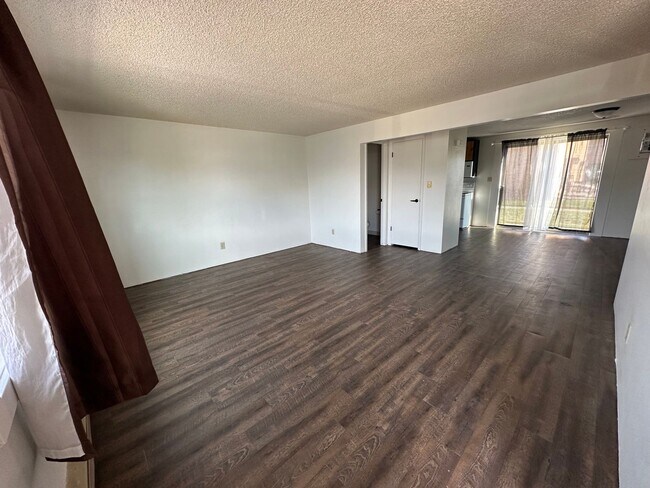 Building Photo - Modernly updated two bedroom, one and half bathroom townhome located within walking distance to R...