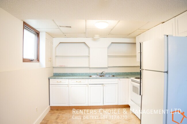 Photo du bâtiment - Basement Suite With Assigned Parking, BONU...