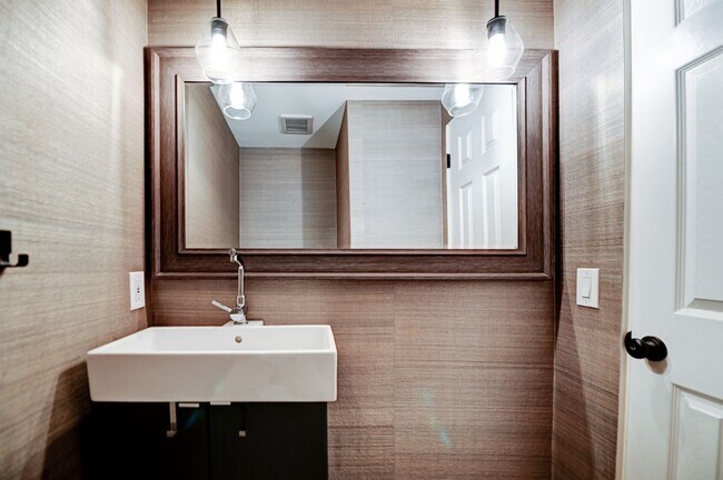 Building Photo - Updated, 3 bedroom 2.5 bath townhouse located in the Newport Riviera Community