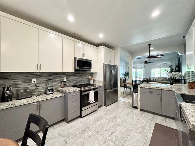Building Photo - AVAILABLE NOW! GORGEOUS 3 Bedroom 2 Bathroom Furnished Pool Home in Indio!