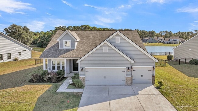 Building Photo - Stunning Lakefront Home with Exceptional V...