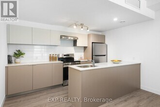 Building Photo - 100-100 Manett Crescent