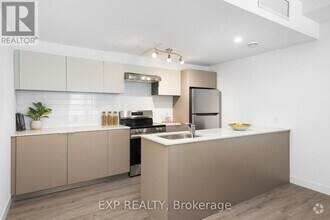 Building Photo - 100-100 Manett Crescent