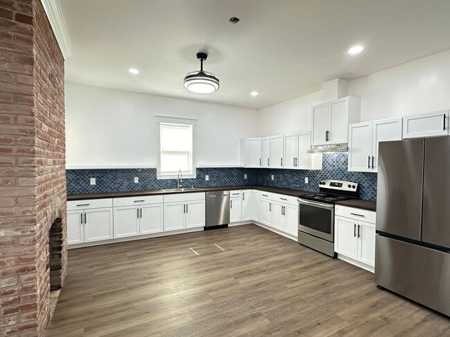 Building Photo - Stunning Newly-Renovated Historic Downtown...