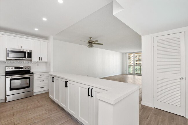 Building Photo - 19380 Collins Ave