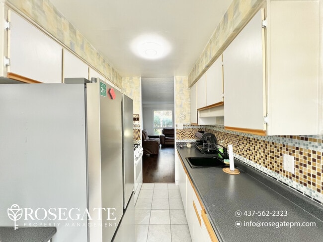 Building Photo - Spacious 4-Bedroom Home with Balcony & Par...