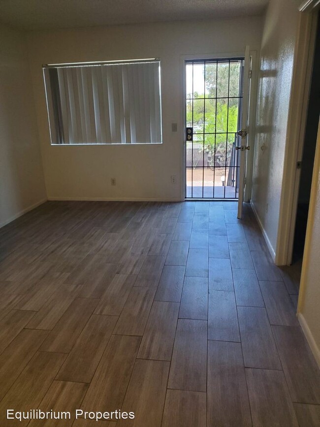 Building Photo - 6590 E Golf Links Rd
